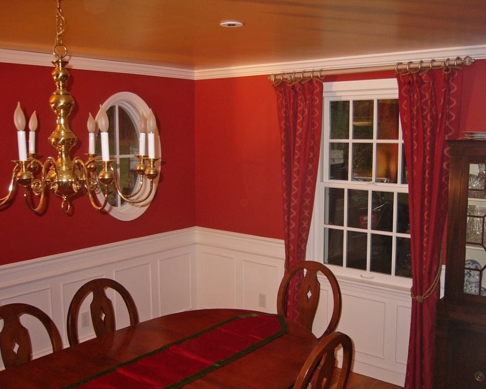 red dining room with round window